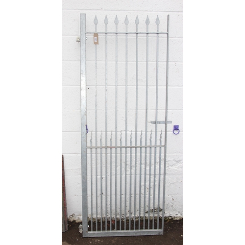 357 - Galvanised swinging gate with arrow finials and integrated hanging brackets. Approx 91cm x 190cm