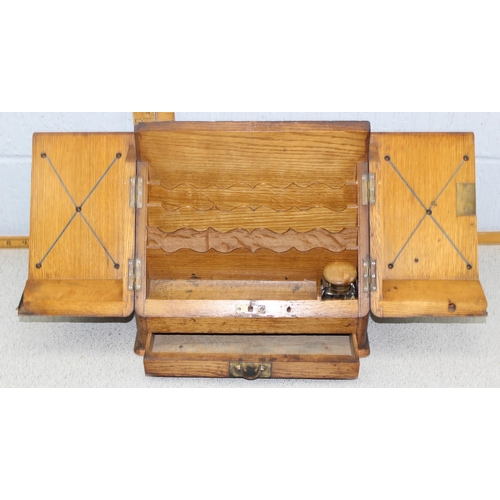 216 - Edwardian oak stationary box with waterfall interior and glass inkwell