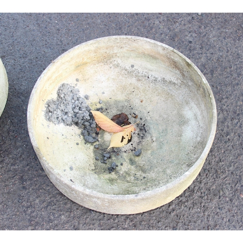 317 - A pair of thin concrete garden planters, approx 60cm diameter