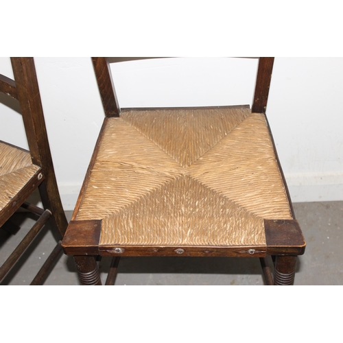 36 - A pair of antique cane seated bedroom chairs