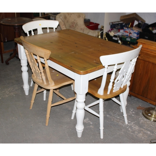 48 - A white painted pine farmhouse country kitchen dining table, approx 124cm x 87cm and 3 chairs, 2 pai... 