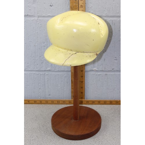 90A - Set of 1930’s painted carved wooden hat forms on later display stands