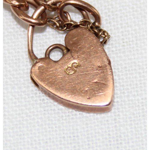 120A - A 9ct gold child's bracelet with heart shaped padlock clasp, approx 2.31g gross & an antique gold pl... 