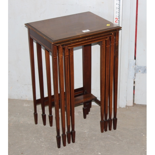 17 - An Edwardian nest of 4 tables in the Sheraton Revival style