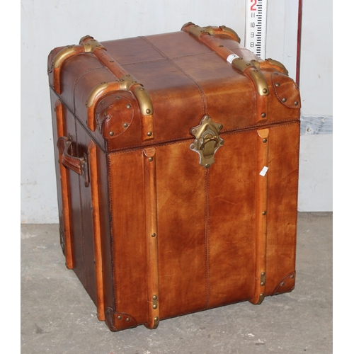 2 - A vintage style leather, brass and wooden storage trunk table, approx 48cm square