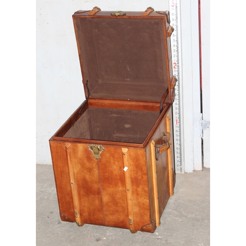 2 - A vintage style leather, brass and wooden storage trunk table, approx 48cm square