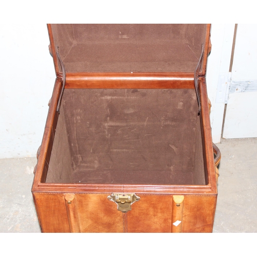 2 - A vintage style leather, brass and wooden storage trunk table, approx 48cm square