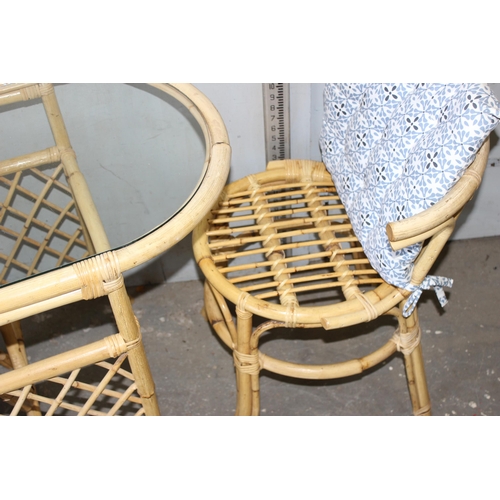 20 - 2 vintage bamboo chairs and a bistro table, possibly by Bruna Boho of Italy