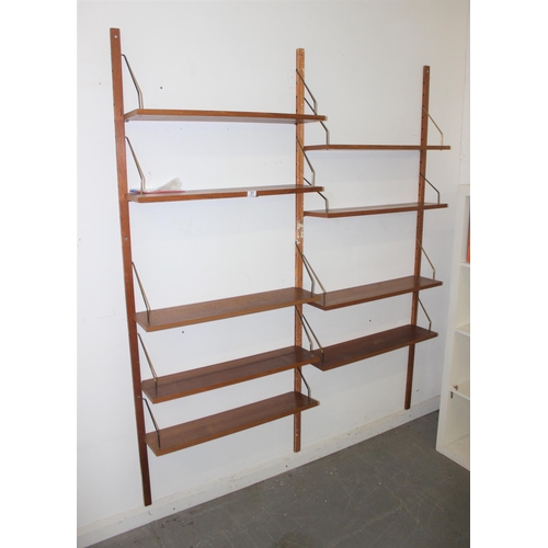 21 - A retro vintage modular wall mounted shelving unit believed to be Danish by Poul Cadovius for Cado