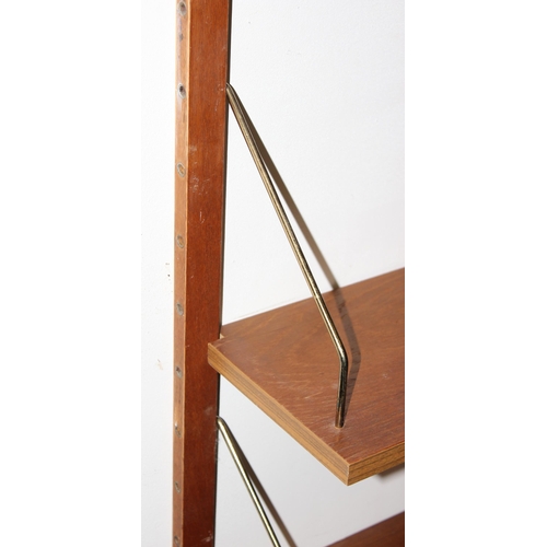 21 - A retro vintage modular wall mounted shelving unit believed to be Danish by Poul Cadovius for Cado