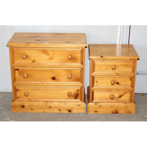 23 - A pine 3 drawer chest of drawers and a matching pine 3 drawer bedside cabinet (2)