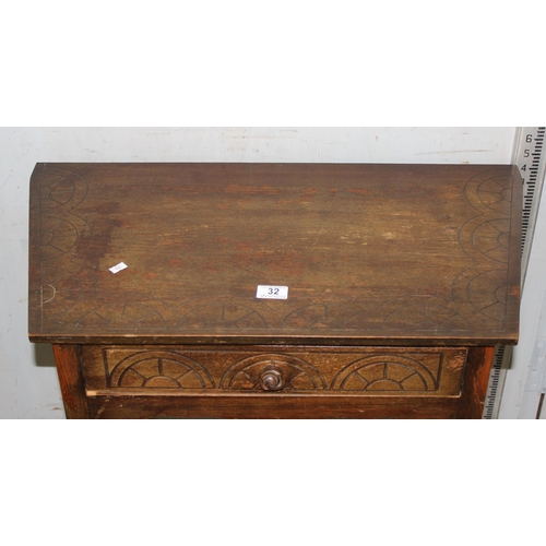 32 - 17th century style side table with draw & carved details, approx 75cm wide