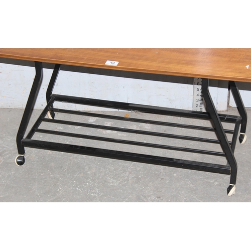 43 - Retro wooden top coffee table with metal wheeled base