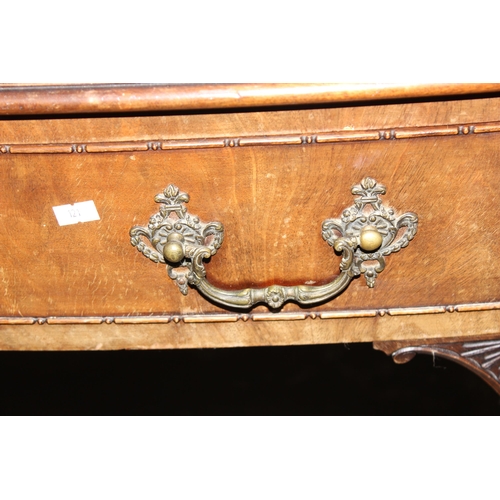 49 - Large antique mahogany serpentine fronted desk with good carved detail, oak lined draws & brass cast... 