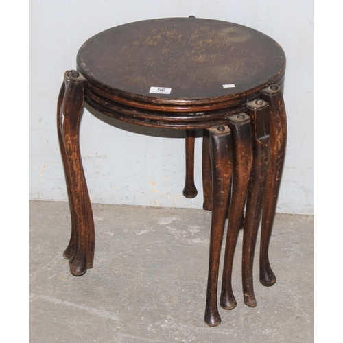 56 - Unusual next of 4 round topped stacking tables with pro patent no.26711 stamped to underside