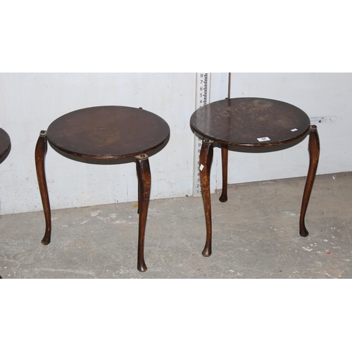 56 - Unusual next of 4 round topped stacking tables with pro patent no.26711 stamped to underside