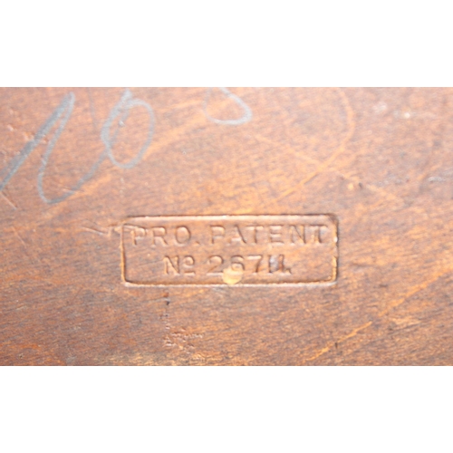 56 - Unusual next of 4 round topped stacking tables with pro patent no.26711 stamped to underside