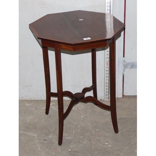 62 - Edwardian mahogany octagonal table with Sheraton inlay