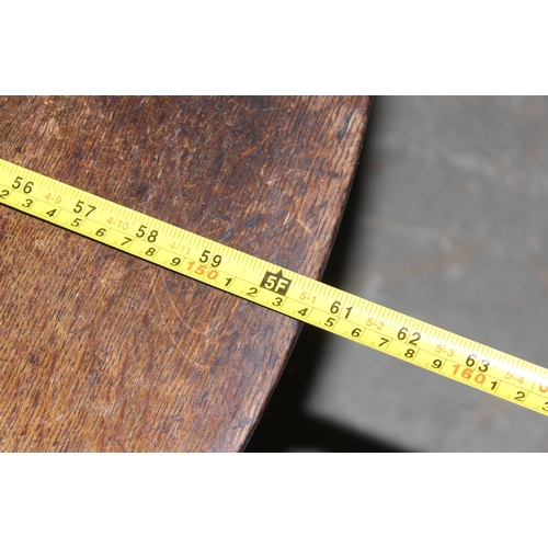 7 - An 18th century oak dropleaf table with drawer, approx 127cm wide (155cm when extended)