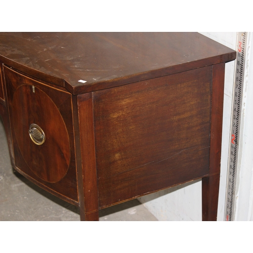 75 - An antique mahogany bow fronted sideboard, approx 125cm wide