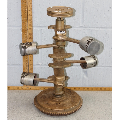 412 - An unusual engine piston sculpture, likely a candle stand or a table base