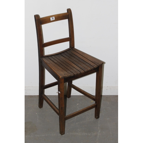 67 - A vintage wooden slatted child's correction chair