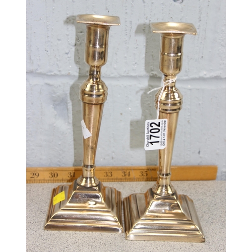 1702 - 2 pairs of brass candlesticks one with copper inlay possibly from Art Deco period