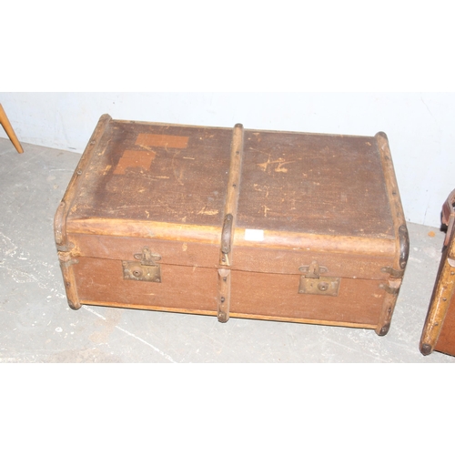 73 - 2 vintage wooden and canvas covered trunks