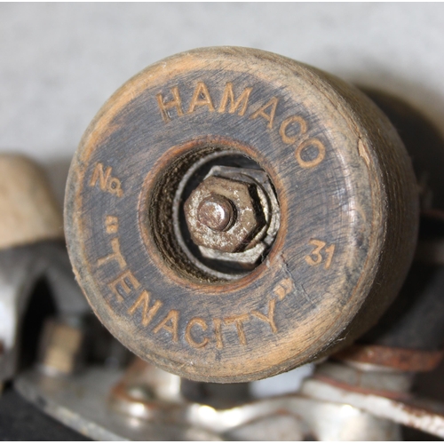 750 - Pair of vintage roller skates & ice skates by Marsden Bro. & an Art Nouveau snooker cue rack