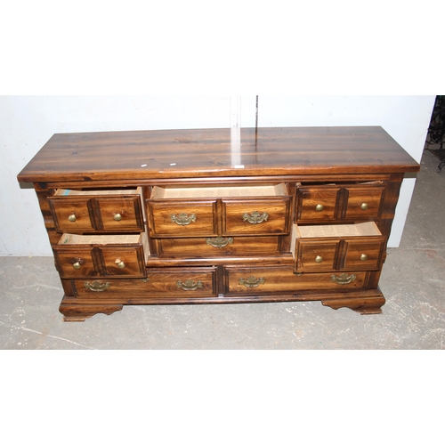 77 - Pine stained sideboard with brass handles, approx 168cm wide