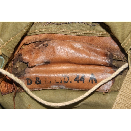 1426 - A WW2 period 1944 dated military backpack and one other (2)