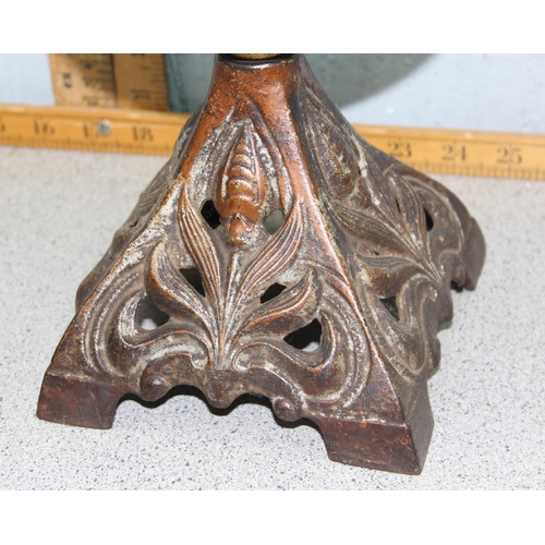 235 - Vintage oil lamp with cast iron base