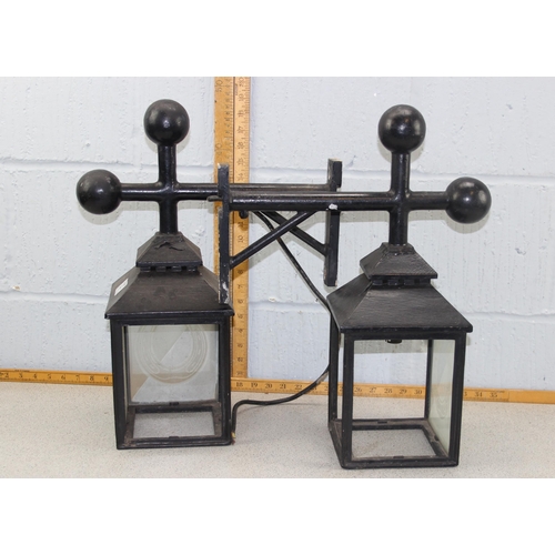 237 - A set of 4 hanging outdoor lamps with horseshoe glass panels