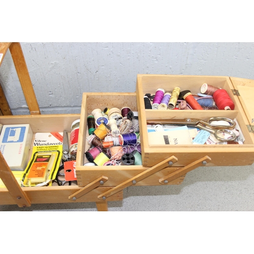 283 - Vintage wooden cantilever sewing box and contents