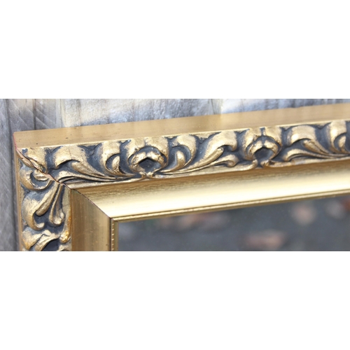 413 - A large gilt framed wall mirror