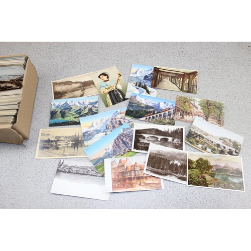 557 - Box of assorted vintage postcards