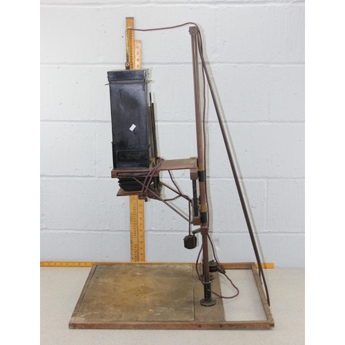 702 - A vintage overhead projector or enlarger on wooden stand