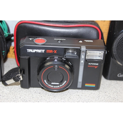 704 - Roberts DAB radio, another radio and 3 vintage cameras