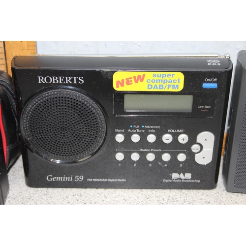 704 - Roberts DAB radio, another radio and 3 vintage cameras