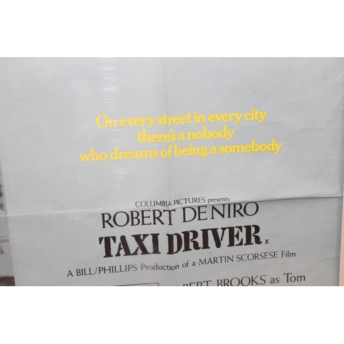 421 - A UK quad film poster for 'Taxi Driver' starring Robert De Niro, approx 101cm x 76cm, printed by Lon... 