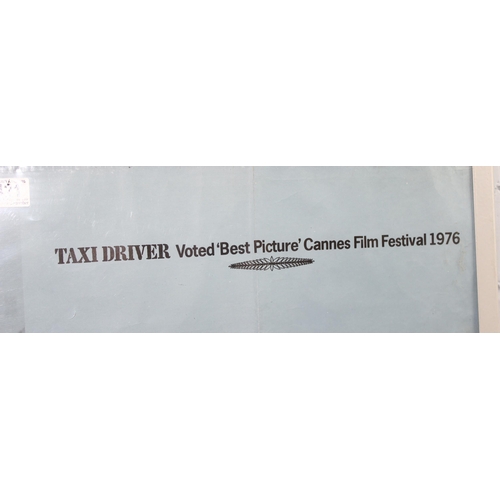 421 - A UK quad film poster for 'Taxi Driver' starring Robert De Niro, approx 101cm x 76cm, printed by Lon... 