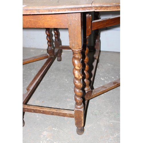 93 - Antique oak drop leaf dining table with barley twist supports