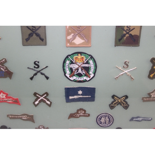 1436 - Glazed display of various shooting patches and badges etc, Small Arms School Sniper Proficiency etc