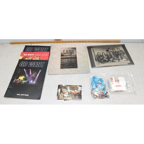 666 - Qty of assorted rock music memorabilia to inc photographs, posters, concert passes, badges, programm... 