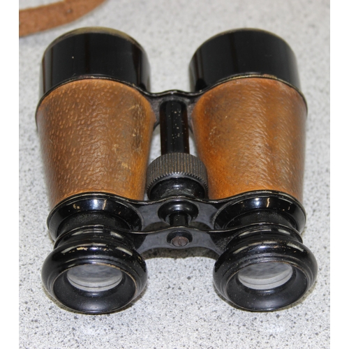 707 - 3 pairs of vintage binoculars, one in military style leather case