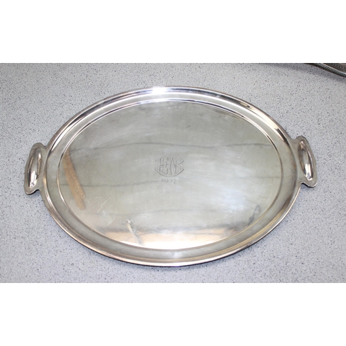 1011 - 3 silver plated drinks trays, two with gallery, one 1930’s Art Deco oval shaped design. (3 items)