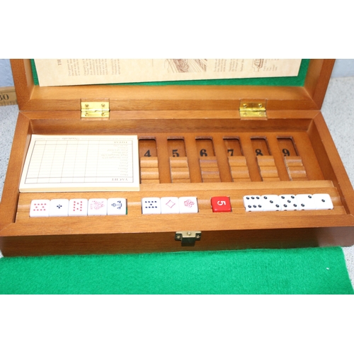 1517 - Vintage Mahjong set in carry case with instruction books, counting sticks, dice etc and a ‘The Sailo... 