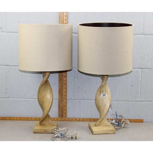 241 - A pair of designer twisted wooden lamps with shades