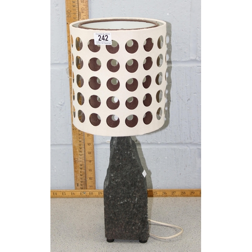 242 - An unusual heavy slate table lamp with shade