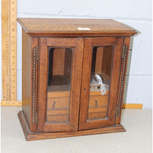 287 - A vintage oak tabletop cabinet with 4 small drawers